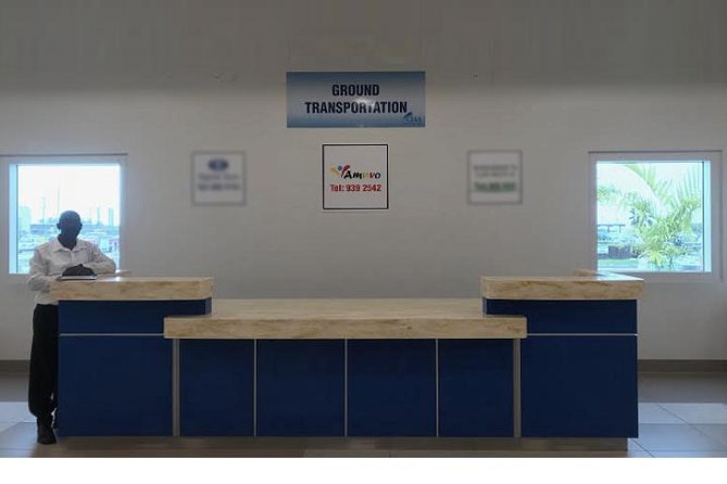 Grand Cayman Shared Airport Transfer - The ride experience: small bus energy and A/C comfort