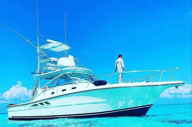Luxury Private Fishing Charters - FULL DAY CHARTER - Meeting at Cayman Islands Yacht Club, and ending right where you started