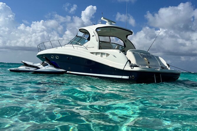 Private Luxury HalfDay w/Jetski Stingray City, Snorkeling & Starfish Beach Tour - Getting on the Boat: Yacht Club, Island Splash, and a Clean Start