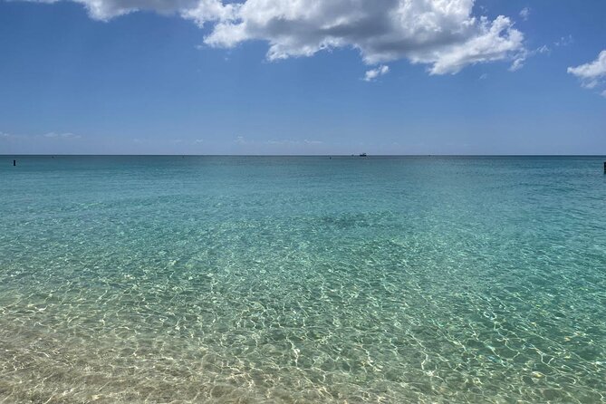 Stingray City and Seven Mile Beach Adventure Tour - Seven Mile Beach in 90 minutes: relaxing, cooling off, and being practical