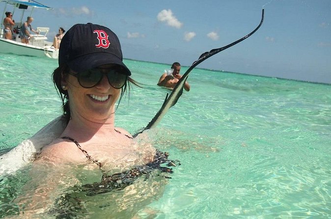 Stingray City Experience Plus Two Snorkeling Stops on Grand Cayman - Pickup and meeting points: Seven Mile Beach convenience plus cruise clarity