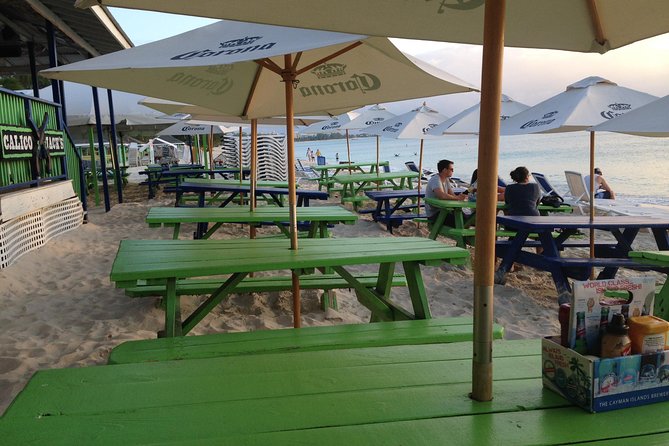 West Bay Sightseeing Tour Plus Seven Mile Beach Visit - Photo Stops Through Georgetown and Camana Bay Style Waterfront Views